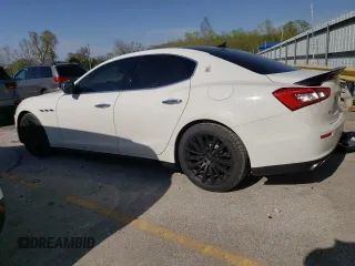 2016 Maserati Ghibli S Q4 with VIN ZAM57RTA7G1171371, listed as a Copart auction lot 49334553 with 57,087 mi miles. Bid and sale history available at carsss.com. Image 2.