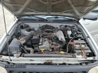 2001 Toyota Tacoma z VIN 5TEPM62N71Z875981, wystawiony jako Copart lot #61310975 z przebiegiem 256 779 mil mil oraz Czysty tytuł • Clean title. Historia ofert i sprzedaży dostępna na DreamBid. Obrazek 11.