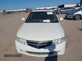 2007 Acura TSX z VIN JH4CL96817C011893, wystawiony jako IAAI lot #42231111 z przebiegiem 162 577 mil mil oraz . Historia ofert i sprzedaży dostępna na DreamBid. Obrazek 13.