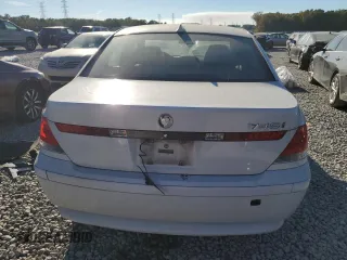 2004 BMW 7 Series 745i with VIN WBAGL63484DP68795, listed as a Copart auction lot 77201084 with 134,044 mi miles and Salvage Title. Bid and sale history available at DreamBid. Image 6.