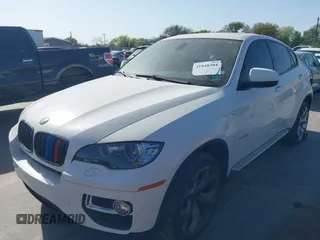 2014 BMW X6 xDrive35i z VIN 5UXFG2C5XE0C44062, wystawiony jako IAAI lot #41848304 z przebiegiem 154 683 mil mil oraz . Historia ofert i sprzedaży dostępna na DreamBid. Obrazek 20.