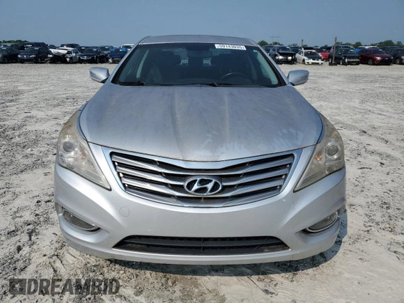 2013 Hyundai Azera z VIN KMHFG4JG9DA252768, wystawiony jako Copart lot #59143035 z przebiegiem 118 260 mil mil oraz Czysty tytuł • Clean title. Historia ofert i sprzedaży dostępna na DreamBid. Obrazek 5.