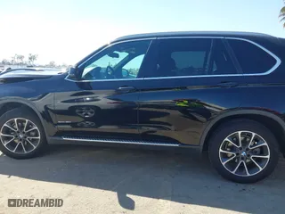 2017 BMW X5 sDrive35i with VIN 5UXKR2C5XH0U17833, listed as a IAAI auction lot 41856074 with 115,666 mi miles. Bid and sale history available at carsss.com. Image 15.