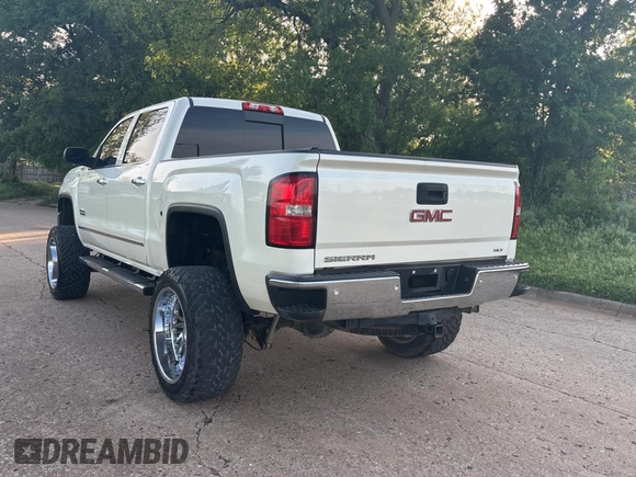 2015 GMC Sierra 1500 SLT with VIN 3GTU2VEC0FG239547, listed as a Copart auction lot 54957305 with 135,497 mi miles and Clean Title. Bid and sale history available at DreamBid. Image 3.