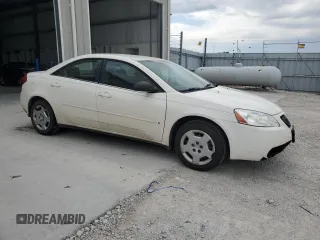2006 Pontiac G6 1SV with VIN 1G2ZF55BX64264023, listed as a Copart auction lot 57665925 with 136,134 mi miles and Salvage title. Bid and sale history available at DreamBid. Image 4.