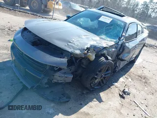 2019 Dodge Charger SXT with VIN 2C3CDXJG1KH537825, listed as a IAAI auction lot 41482387 with 71,062 mi miles and . Bid and sale history available at DreamBid. Image 16.