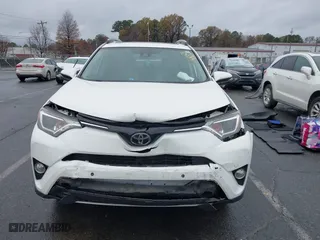 2017 Toyota RAV4 XLE with VIN JTMRFREV6HJ716907, listed as a IAAI auction lot 41056444 with 118,335 mi miles. Bid and sale history available at carsss.com. Image 12.