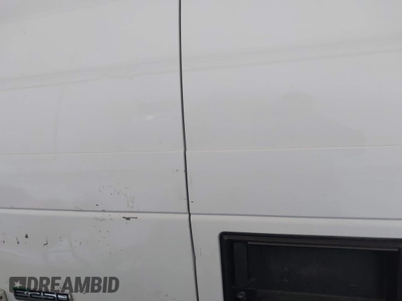 2011 Ford Econoline Cargo Commercial with VIN 1FTNE2EW6BDB06514, listed as a IAAI auction lot 42177011 with 336,946 mi miles. Bid and sale history available at carsss.com. Image 16.