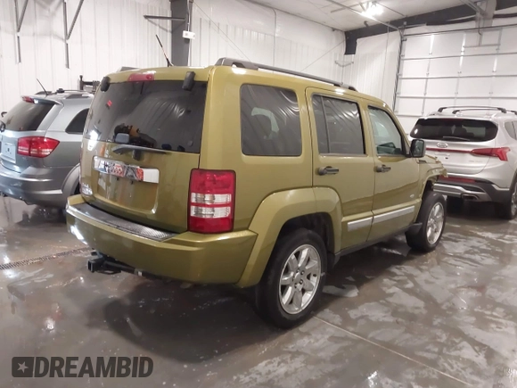 2012 Jeep Liberty Sport with VIN 1C4PJMAKXCW171150, listed as a IAAI auction lot 41864786 with 166,432 mi miles and . Bid and sale history available at carsss.com. Image 4.