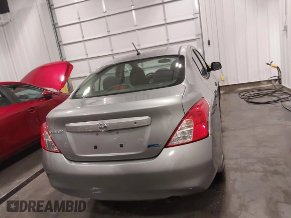 2012 Nissan Versa SV with VIN 3N1CN7AP0CL910681, listed as a IAAI auction lot 41405297 with 77,635 mi miles. Bid and sale history available at carsss.com. Image 17.