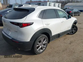 2022 Mazda CX-30 S Premium with VIN 3MVDMBDL7NM412263, listed as a IAAI auction lot 41779877 with 42,088 mi miles and . Bid and sale history available at carsss.com. Image 4.