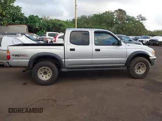 2003 Toyota Tacoma PreRunner z VIN 5TEGN92N63Z170929, wystawiony jako IAAI lot #41778256 z przebiegiem 202 135 mil mil oraz . Historia ofert i sprzedaży dostępna na DreamBid. Obrazek 13.