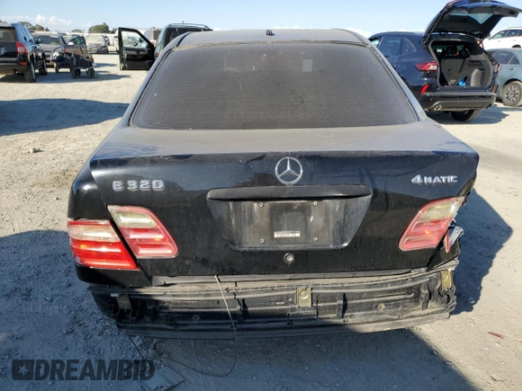 2001 Mercedes-Benz E-Class AWD with VIN WDBJF82JX1X044733, listed as a Copart auction lot 74825034 with 153,046 mi miles and Salvage Title. Bid and sale history available at carsss.com. Image 6.