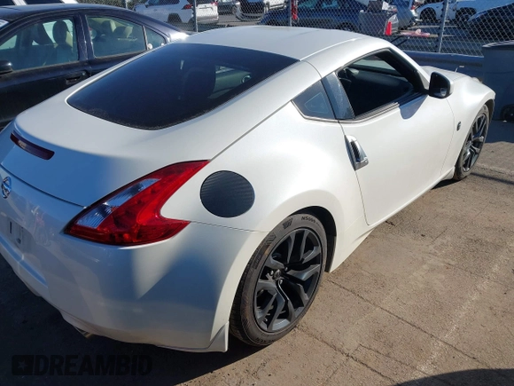 2017 Nissan 370Z with VIN JN1AZ4EHXHM954875, listed as a IAAI auction lot 41641554 with 101,093 mi miles. Bid and sale history available at carsss.com. Image 4.