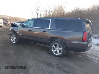 2016 Chevrolet Suburban LS with VIN 1GNSKGKC6GR412651, listed as a IAAI auction lot 41450964 with 114,833 mi miles. Bid and sale history available at carsss.com. Image 3.