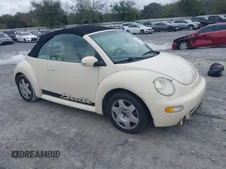 2004 Volkswagen Beetle with VIN 3VWCM21Y64M306721, listed as a IAAI auction lot 41611494 with 183,434 mi miles and . Bid and sale history available at DreamBid. Image 1.