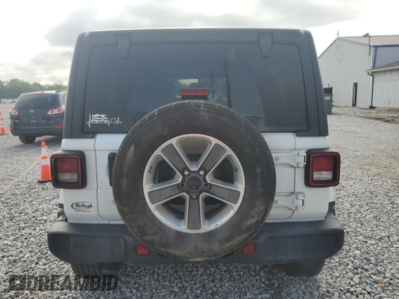 2019 Jeep Wrangler Unlimited Sahara с VIN 1C4HJXEG6KW580031, выставлен на аукционе Copart как лот 59687835 с пробегом 136 590 миль миль и Списание • Salvage title. История ставок и продаж доступна на DreamBid. Изображение 6.