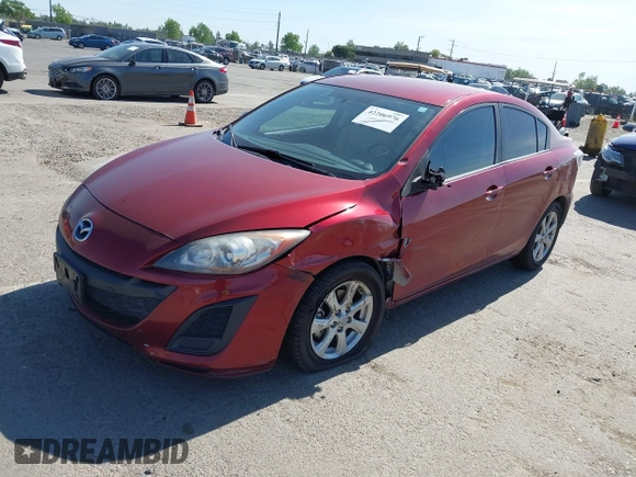2011 Mazda 3 i Touring with VIN JM1BL1VG4B1440294, listed as a IAAI auction lot 42206976 with 183,693 mi miles. Bid and sale history available at carsss.com. Image 2.