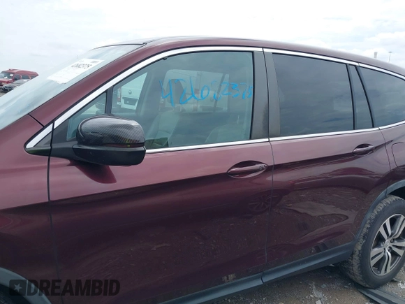 2016 Honda Pilot EX-L with VIN 5FNYF6H55GB082646, listed as a IAAI auction lot 42682375 with 96,314 mi miles and . Bid and sale history available at DreamBid. Image 14.