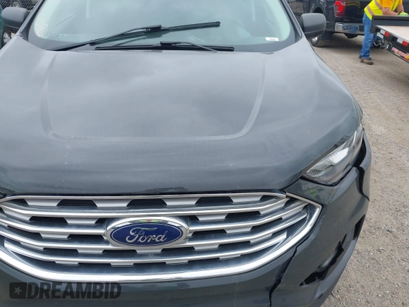 2021 Ford Edge SE with VIN 2FMPK4G97MBA50768, listed as a IAAI auction lot 42748557 with 89,523 mi miles and . Bid and sale history available at DreamBid. Image 11.