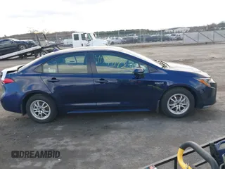 2021 Toyota Corolla Hybrid LE with VIN JTDEAMDE9MJ021431, listed as a IAAI auction lot 41747142 with 165,680 mi miles. Bid and sale history available at carsss.com. Image 13.
