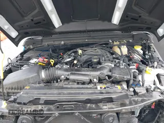 2021 Jeep Gladiator Sport S z VIN 1C6JJTAG9ML604950, wystawiony jako IAAI lot #39912720 z przebiegiem 34 640 mil mil oraz . Historia ofert i sprzedaży dostępna na DreamBid. Obrazek 10.