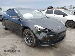 2019 Tesla Model 3 Mid Range with VIN 5YJ3E1EA6KF361808, listed as a IAAI auction lot 41767241 with 96,200 mi miles. Bid and sale history available at carsss.com. Image 1.