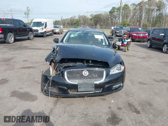 2015 Jaguar XJ with VIN SAJWA1CZ9F8V78228, listed as a IAAI auction lot 41260138 with 52,622 mi miles. Bid and sale history available at carsss.com. Image 12.