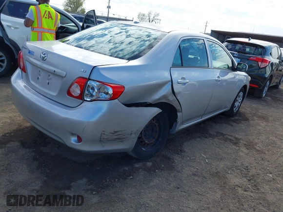 2009 Toyota Corolla with VIN 1NXBU40E39Z092092, listed as a IAAI auction lot 41881741 with 144,309 mi miles. Bid and sale history available at carsss.com. Image 4.