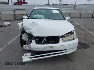 2000 Toyota Camry LE z VIN JT2BF28K3Y0289145, wystawiony jako IAAI lot #42455085 z przebiegiem 202 809 mil mil oraz . Historia ofert i sprzedaży dostępna na DreamBid. Obrazek 12.