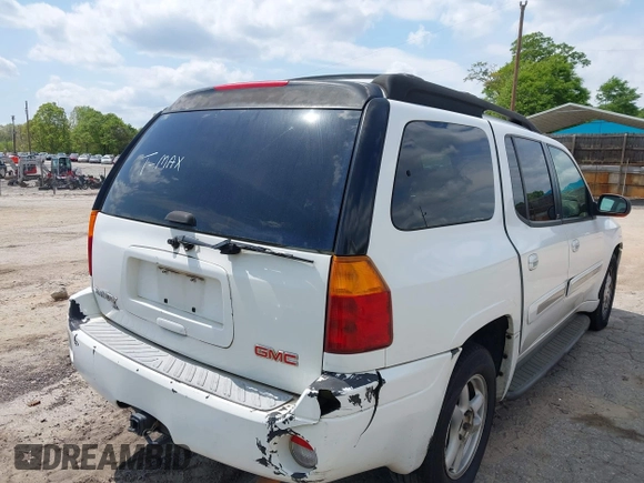 2003 GMC Envoy SLE with VIN 1GKES16S136153880, listed as a IAAI auction lot 42009798 with 289,208 mi miles and . Bid and sale history available at DreamBid. Image 4.