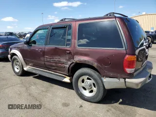 1999 Ford Explorer XLT with VIN 1FMZU34E3XUB50850, listed as a Copart auction lot 52257815 with 162,360 mi miles and Salvage title. Bid and sale history available at DreamBid. Image 2.