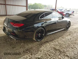 2019 Mercedes-Benz CLS with VIN WDD2J5KB3KA014592, listed as a IAAI auction lot 42074216 with 115,242 mi miles. Bid and sale history available at carsss.com. Image 4.