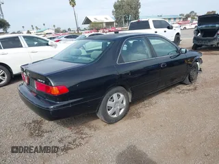 2001 Toyota Camry CE with VIN JT2BG22K910548345, listed as a IAAI auction lot 41723835 with 170,228 mi miles and . Bid and sale history available at DreamBid. Image 4.