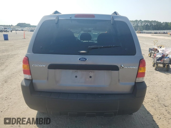 2007 Ford Escape Hybrid с VIN 1FMYU59H47KB16731, выставлен на аукционе Copart как лот 62694895 с пробегом 109 592 миль миль и Чистый • Clean title. История ставок и продаж доступна на DreamBid. Изображение 6.