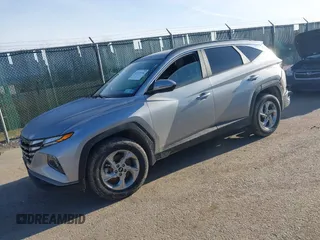 2023 Hyundai Tucson SEL z VIN KM8JBCAE2PU248128, wystawiony jako IAAI lot #41771316 z przebiegiem 52 224 mil mil oraz . Historia ofert i sprzedaży dostępna na DreamBid. Obrazek 2.