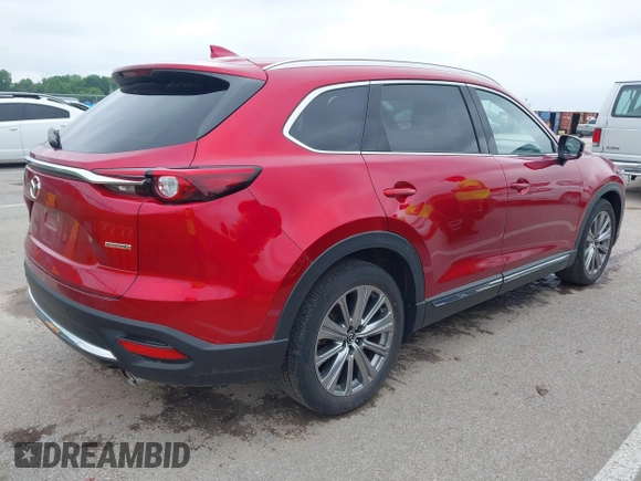 2021 Mazda CX-9 Signature with VIN JM3TCBEY9M0511928, listed as a IAAI auction lot 42231925 with 26,367 mi miles and . Bid and sale history available at DreamBid. Image 4.
