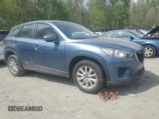 2015 Mazda CX-5 Sport with VIN JM3KE2BE9F0462541, listed as a Copart auction lot 54197105 with 236,682 mi miles and Clean Title. Bid and sale history available at carsss.com. Image 4.