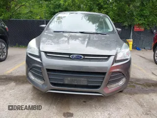 2014 Ford Escape SE z VIN 1FMCU0G98EUC21234, wystawiony jako IAAI lot #42338783 z przebiegiem 124 178 mil mil oraz . Historia ofert i sprzedaży dostępna na DreamBid. Obrazek 6.