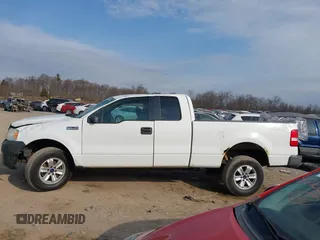 2005 Ford F-150 STX with VIN 1FTRX14W85FB72787, listed as a IAAI auction lot 41702370 with 210,544 mi miles. Bid and sale history available at carsss.com. Image 14.