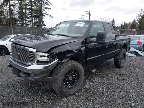 1999 Ford Super Duty F-250 XL with VIN 1FTNX21F2XEC99584, listed as a IAAI auction lot 41611098 with 424,263 mi miles. Bid and sale history available at carsss.com. Image 2.