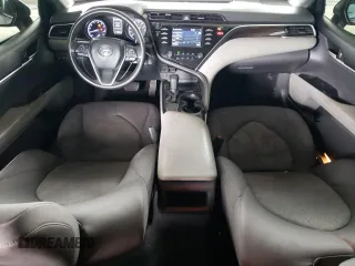 2018 Toyota Camry LE z VIN JTNB11HK8J3025709, wystawiony jako Copart lot #56763315 z przebiegiem 157 941 mil mil oraz Szkoda całkowita • Salvage title. Historia ofert i sprzedaży dostępna na DreamBid. Obrazek 8.