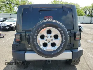 2015 Jeep Wrangler Unlimited Wrangler X with VIN 1C4BJWEG4FL754492, listed as a Copart auction lot 55305825 with 108,078 mi miles and Salvage title. Bid and sale history available at DreamBid. Image 6.