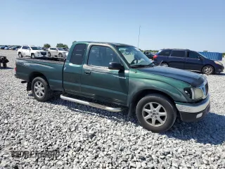 2002 Toyota Tacoma with VIN 5TEVL52N12Z107080, listed as a Copart auction lot 52674425 with 212,144 mi miles and Salvage title. Bid and sale history available at DreamBid. Image 4.