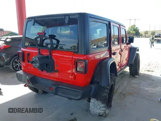 2018 Jeep Wrangler Unlimited Rubicon with VIN 1C4HJXFG0JW159287, listed as a IAAI auction lot 41911012 with 93,784 mi miles and . Bid and sale history available at DreamBid. Image 4.