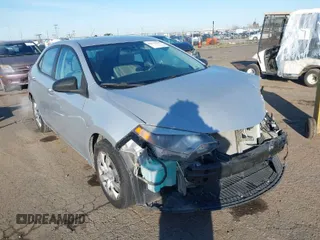 2015 Toyota Corolla L z VIN 5YFBURHE7FP297140, wystawiony jako IAAI lot #41532905 z przebiegiem 64 004 mil mil oraz . Historia ofert i sprzedaży dostępna na DreamBid. Obrazek 1.