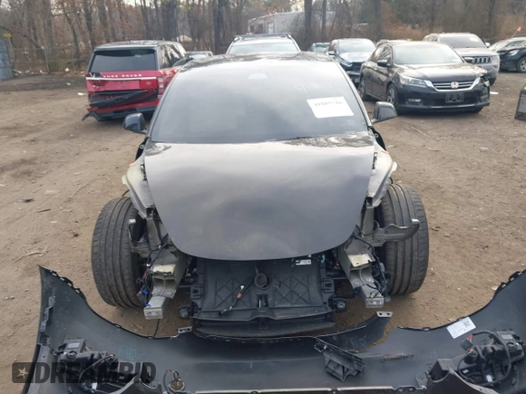 2023 Tesla Model 3 Long Range with VIN 5YJ3E1EB6PF673532, listed as a IAAI auction lot 41885716 with 39,690 mi miles and . Bid and sale history available at DreamBid. Image 12.