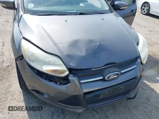 2013 Ford Focus SE with VIN 1FADP3F28DL233822, listed as a IAAI auction lot 42583041 with 135,728 mi miles and . Bid and sale history available at DreamBid. Image 6.