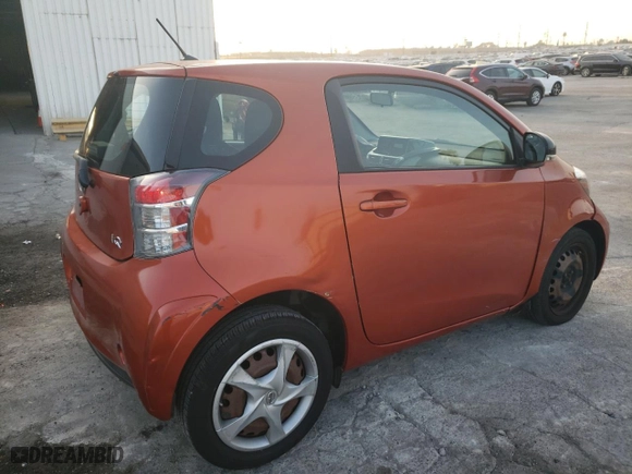 2012 Scion iQ with VIN JTNJJXB00CJ012327, listed as a Copart auction lot 87223244 with 111,223 mi miles and Salvage Title. Bid and sale history available at carsss.com. Image 3.