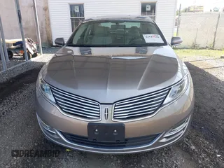 2016 Lincoln MKZ z VIN 3LN6L2J90GR614644, wystawiony jako IAAI lot #42547420 z przebiegiem 45 237 mil mil oraz . Historia ofert i sprzedaży dostępna na DreamBid. Obrazek 12.